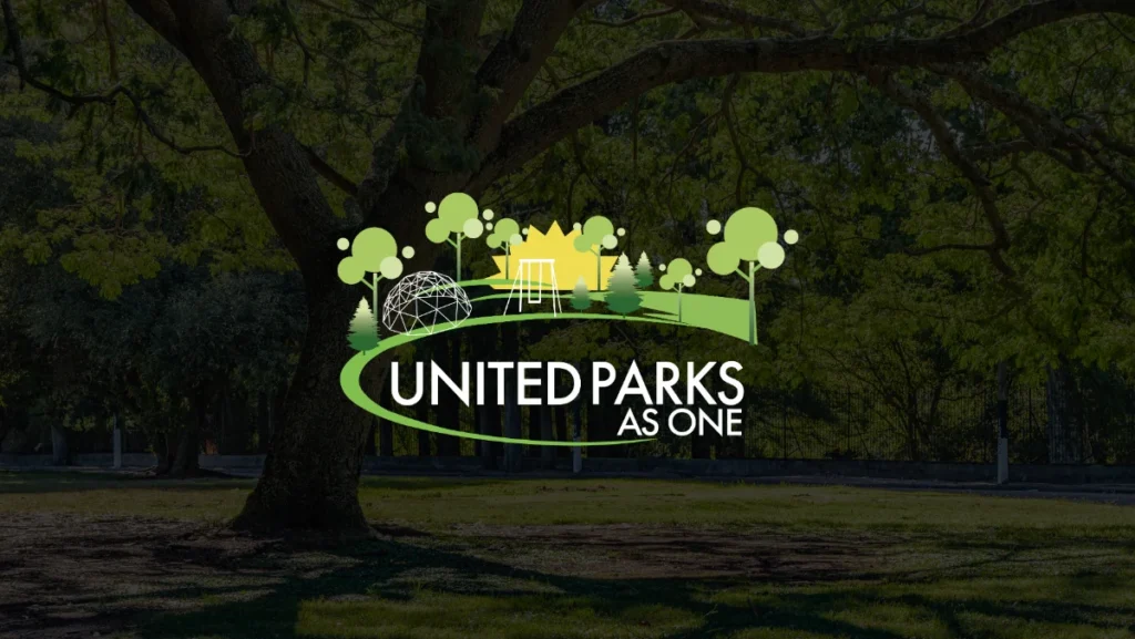 United Parks As One logo overlaid on a tree-filled park background in Newark, NJ.