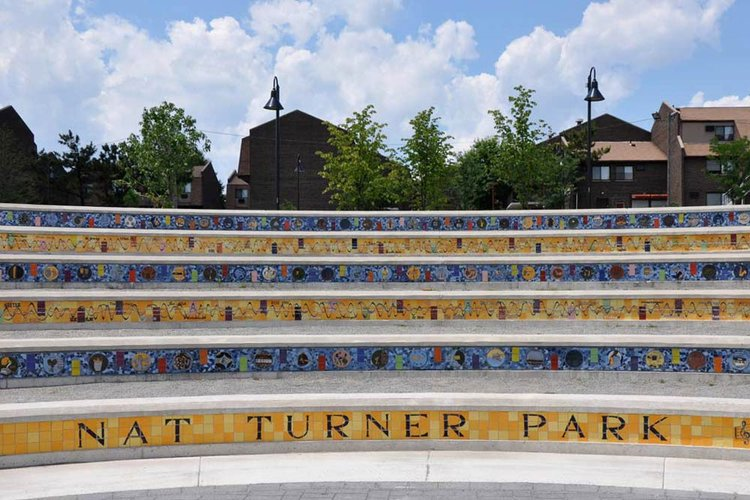Colorful tile artwork decorating the steps of the amphitheater at Nat Turner Park in Newark, NJ
