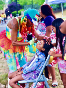 Face painting activity for children during National Night Out at Nat Turner Park in Newark