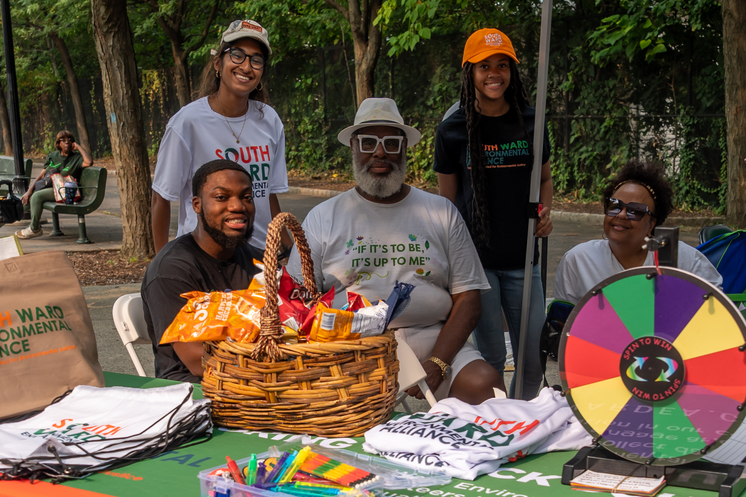 Community partners staffing an outreach table during National Night Out in Newark.